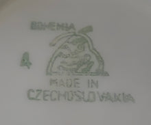 Lade das Bild in den Galerie-Viewer, MOCCA UNTERTASSE - Porzellan, Goldrand Geometrisch Abstrakt Symbol Zeichen Wappen Dekor Motiv