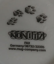 Lade das Bild in den Galerie-Viewer, 2er ESPRESSO KAFFEEGEDECK "African Spirit" - Porzellan, African Spirit Aufschrift Fauna Tierspuren Zebra Giraffe Nashorn Löwe Elefant Motiv Dekor