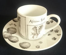 Lade das Bild in den Galerie-Viewer, 2er ESPRESSO KAFFEEGEDECK &quot;African Spirit&quot; - Porzellan, African Spirit Aufschrift Fauna Tierspuren Zebra Giraffe Nashorn Löwe Elefant Motiv Dekor

