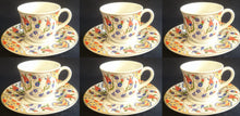 Lade das Bild in den Galerie-Viewer, MOCCA~ KAFFEETASSE &quot;Junbostar&quot; - Porzellan, Goldrand Linien Flora Blumenblüten Pflanzen Motiv Dekor
