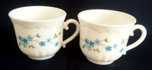 Lade das Bild in den Galerie-Viewer, TEETASSE - Acrylglas, Blumen Blüten Wolken Relief Rand Dekor
